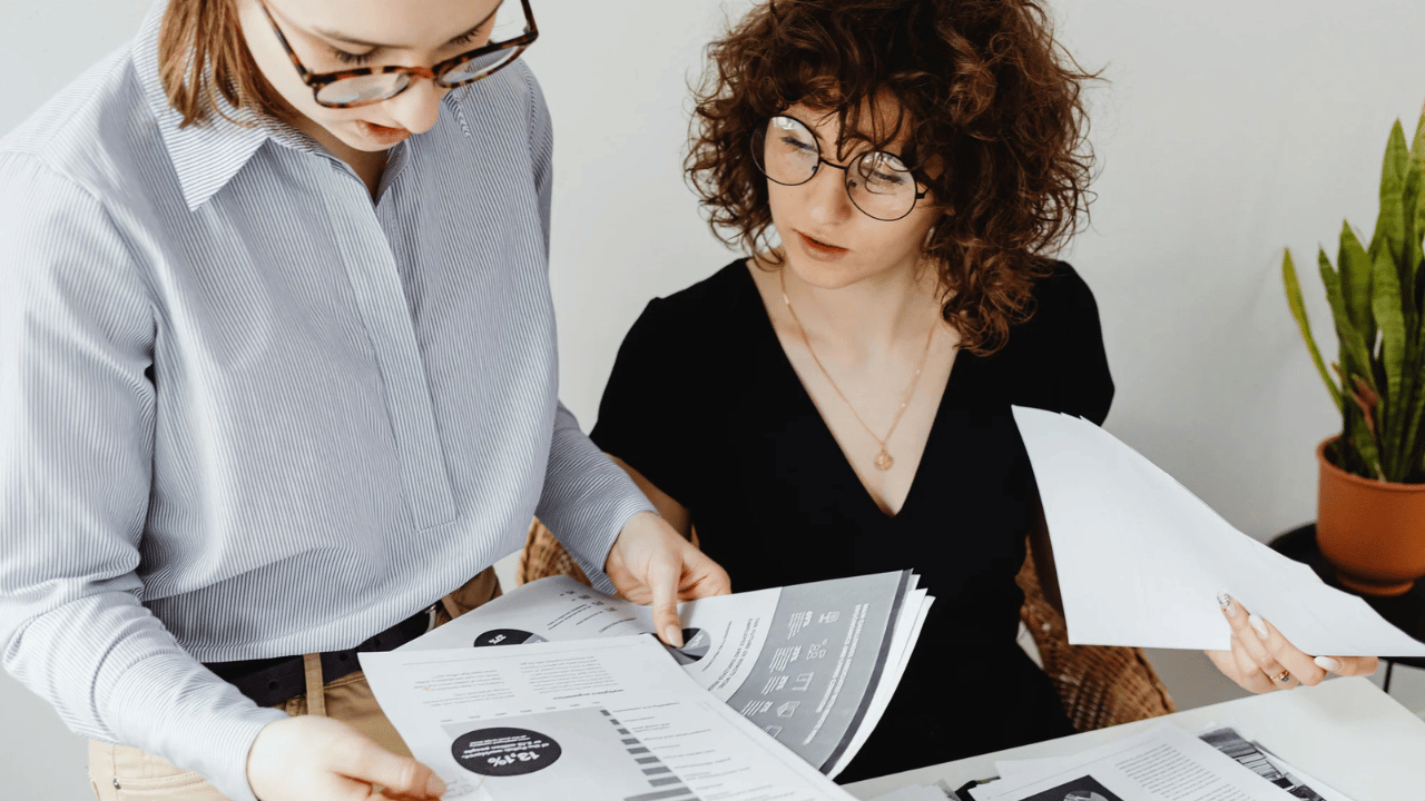 Women Reading Energy Management Reporting